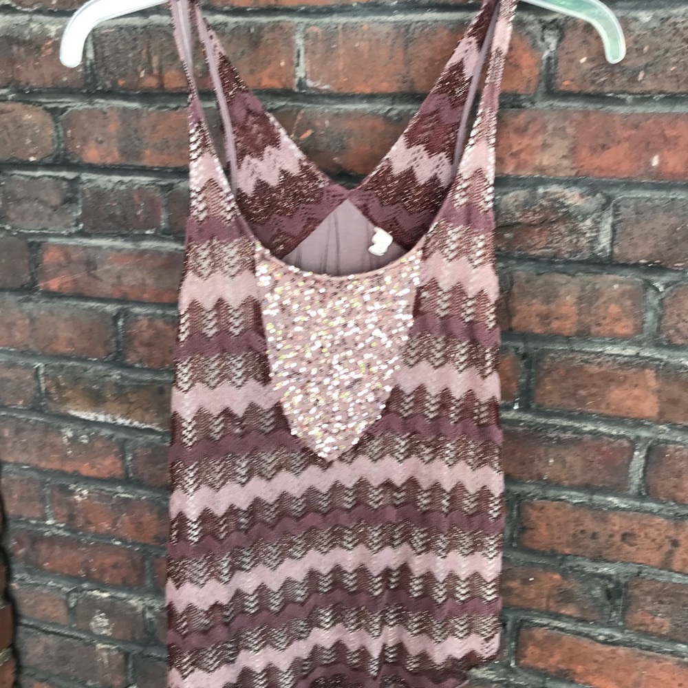 Tank top with embellishments.